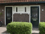 Singel 7-9. Metselwerk in rechtopstaand halfsteens verband en houten betimmering.
<br/>
Corrie Groen- Pickhard, 2017-05-06